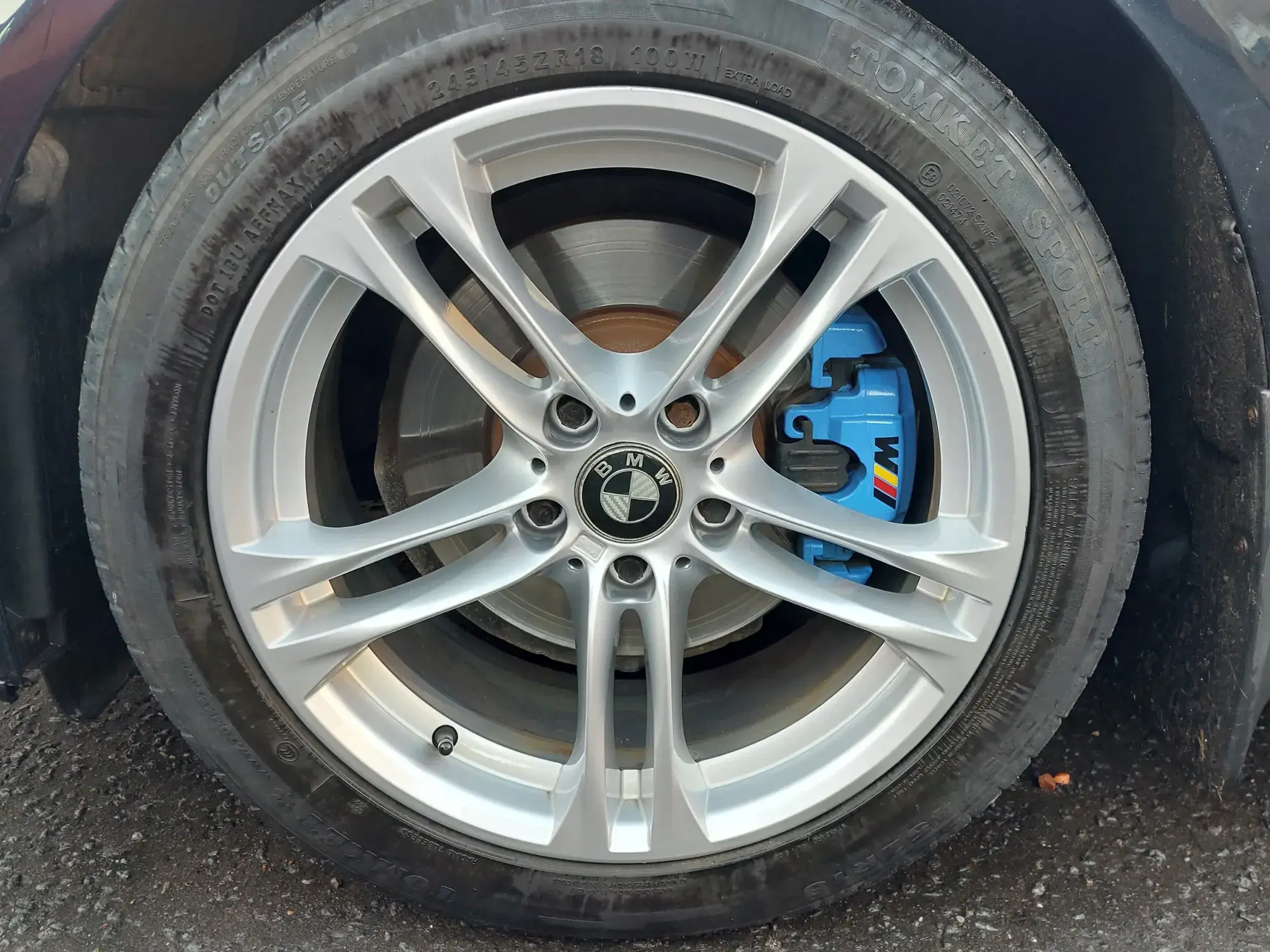 Alloy wheel finished in a custom motorsport colour after refinishing